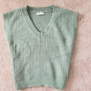 Small Vestique green sweater